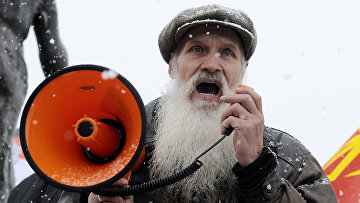 Участник шествия «Русский марш» в Красноярске