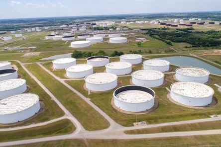 Crude oil storage tanks are seen in an aerial photograph at the Cushing oil hub in Cushing, Oklahoma, U.S. April 21, 2020. REUTERS/Drone Base