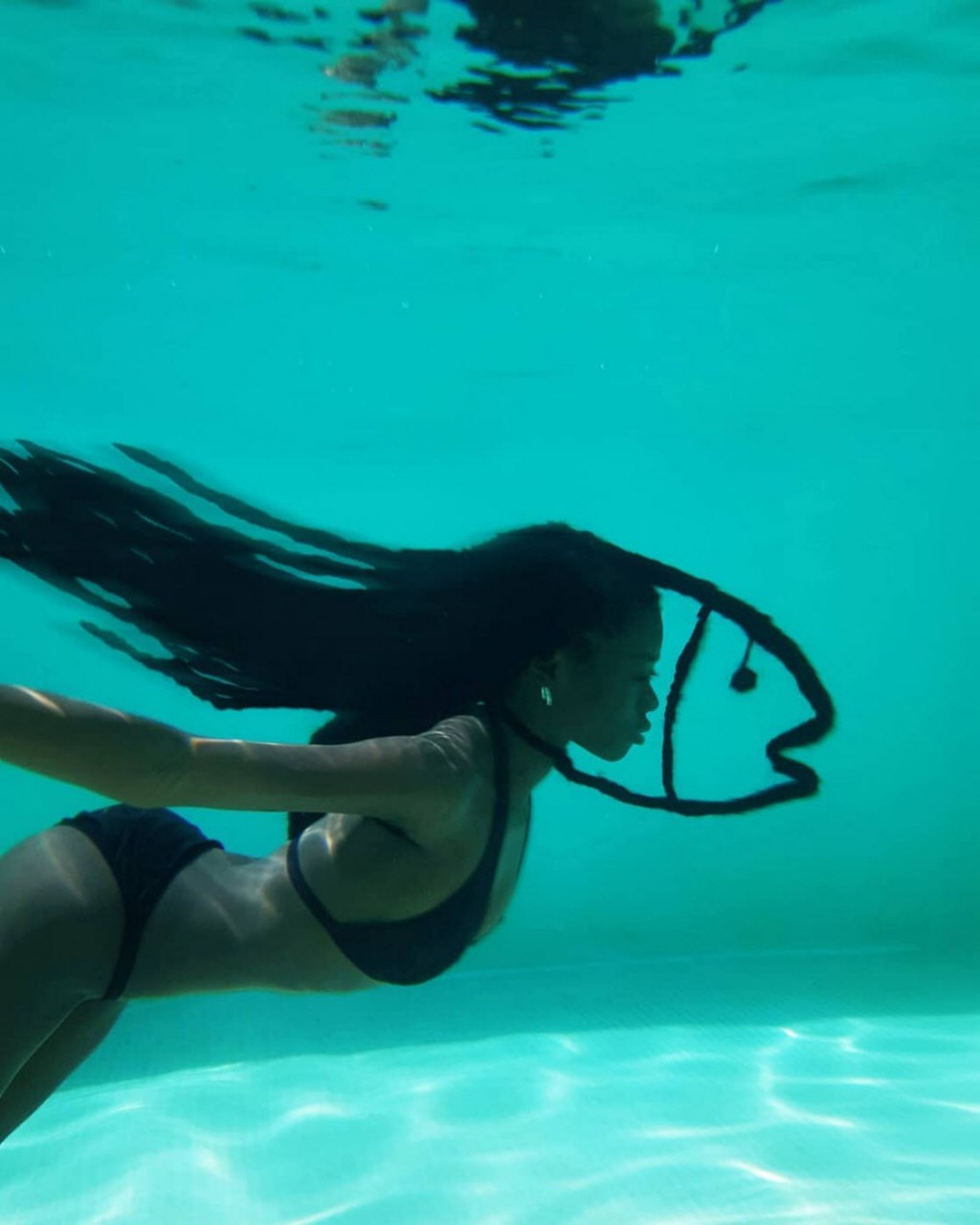 Удивительные прически художницы из Кот-д’Ивуара Удивительные прически художницы из Кот-д’Ивуара волосы