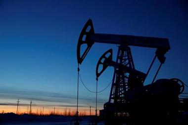 FILE PHOTO: Pump jacks are seen outside the West Siberian city of Kogalym, Russia, January 25, 2016. REUTERS/Sergei Karpukhin/File Photo 