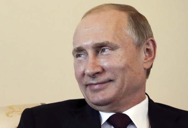 "Обнажил я бицепс ненароком" - Путин пошутил о поездке делегации РФ в Давос