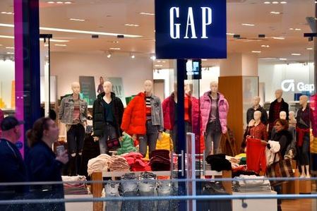 A woman shops at a Gap store as pre-Thanksgiving and Christmas holiday shopping accelerates at the King of Prussia Mall in King of Prussia, Pennsylvania, U.S. November 22, 2019. REUTERS/Mark Makela