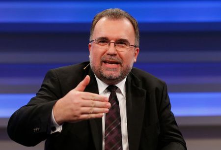 Siegfried Russwurm, chief technology officer and member of the managing board of Germany's Siemens AG addresses the CyberSecurity summit in Bonn November 3, 2014. REUTERS/Wolfgang Rattay (GERMANY - Tags: POLITICS BUSINESS TELECOMS CRIME LAW HEADSHOT)