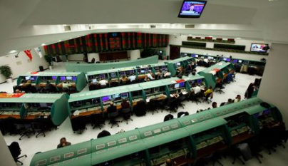 Traders work on their computers during the start of the first trading session of 2012 at the Istanbul Stock Exchange January 2, 2012. REUTERS/Murad Sezer (TURKEY - Tags: BUSINESS)