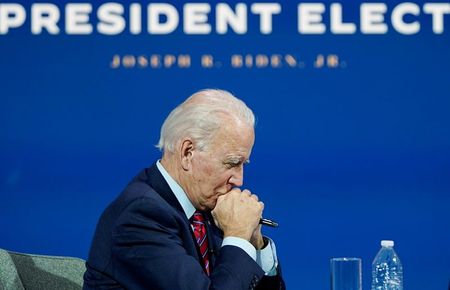 U.S. President-elect Joe Biden listens as he holds a videoconference meeting with members of the U.S Conference of Mayors at his transition headquarters in Wilmington, Delaware, U.S., November 23, 2020. REUTERS/Joshua Roberts