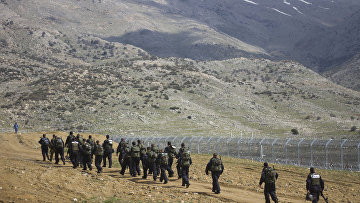 Израильские полицейские на границе с Сирией у города Мадждаль-Шамс