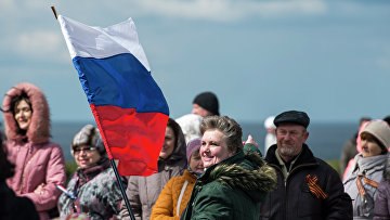 Участники праздничных мероприятий в Севастополе, посвященных годовщине "Крымской весны".