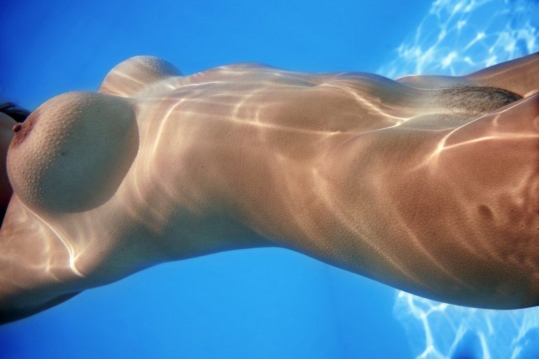 Naked underwater swimming