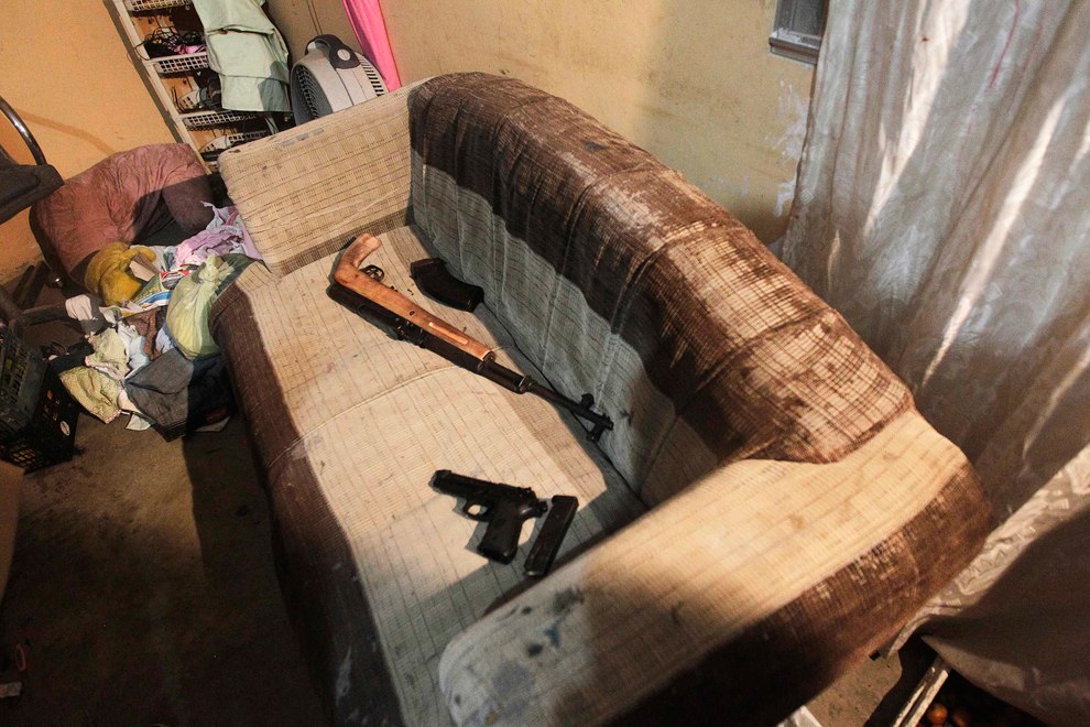 Конфискованное оружие после ареста нескольких членов банды в Сан-Педро-Сула