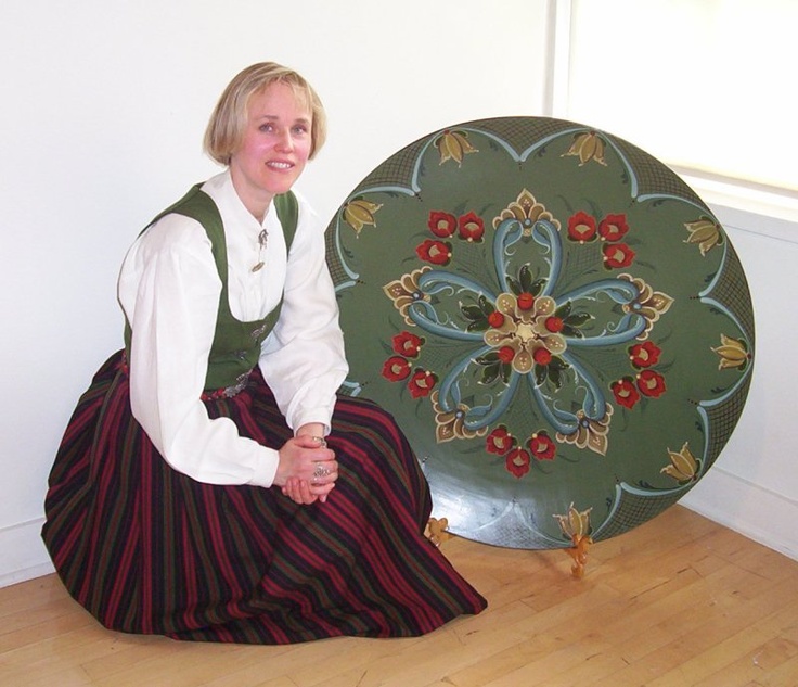 Artist with her Norwegian Rosemaling