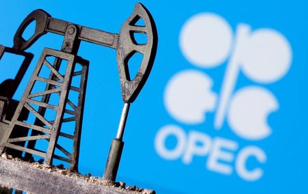 FILE PHOTO: A 3D-printed oil pump jack is seen in front of displayed OPEC logo in this illustration picture, April 14, 2020. REUTERS/Dado Ruvic/Illustration