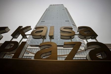 FILE PHOTO: A picture shows the Kaisa Plaza of Kaisa Group Holdings Ltd on a hazy day in Beijing, China, November 5, 2021. REUTERS/Thomas Peter/File Photo