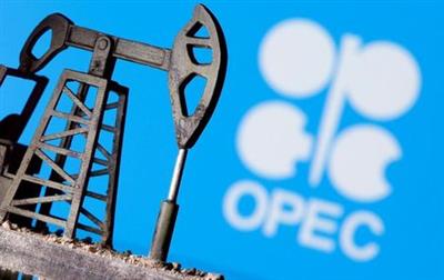 FILE PHOTO: A 3D printed oil pump jack is seen in front of displayed OPEC logo in this illustration picture, April 14, 2020. REUTERS/Dado Ruvic/File Photo