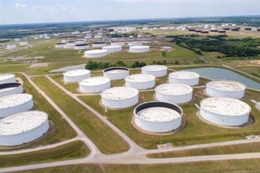 Crude oil storage tanks are seen in an aerial photograph at the Cushing oil hub in Cushing, Oklahoma, U.S. April 21, 2020. REUTERS/Drone Base 