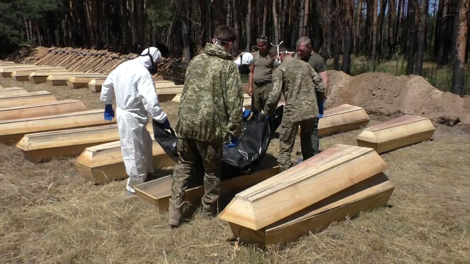 В Старобельске прошли похороны неопознанных украинских боевиков Видео,Репортажи,ФАН-ТВ