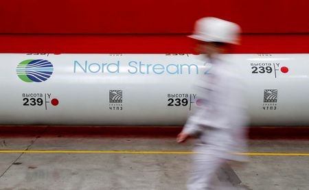 FILE PHOTO: The logo of the Nord Stream 2 gas pipeline project is seen on a pipe at Chelyabinsk pipe rolling plant owned by ChelPipe Group in Chelyabinsk, Russia, February 26, 2020. REUTERS/Maxim Shemetov//File Photo