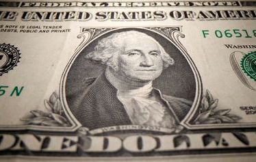 A U.S. Dollar banknote is seen in this illustration taken May 26, 2020. REUTERS/Dado Ruvic/Illustration