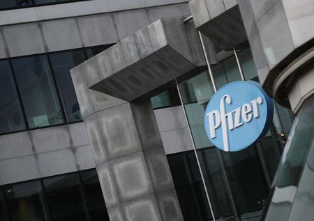 The Pfizer logo is pictured outside a Pfizer office amid the coronavirus disease (COVID-19) outbreak in Brussels, Belgium January 21, 2021. REUTERS/Yves Herman