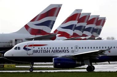 FILE PHOTO: A British Airways plane taxis past tail fins of parked aircraft near Terminal 5 at Heathrow Airport in London, Britain, March 14, 2020. REUTERS/Simon Dawson/File Photo 