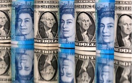 Pound and U.S. dollar bills are seen in this illustration taken January 6, 2020. REUTERS/Dado Ruvic/Illustration