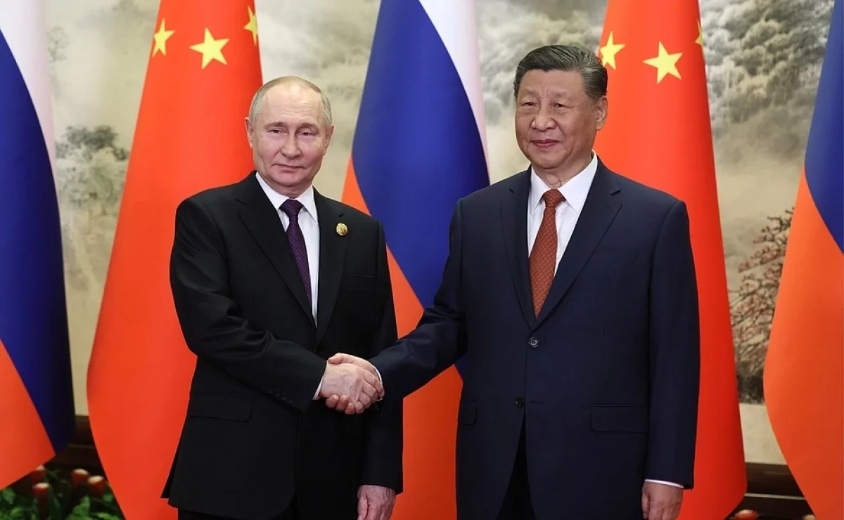 Первый день визита Путина завершился неформальным общением с Си Цзиньпинем