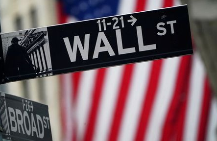 A Wall Street sign is pictured outside the New York Stock Exchange in the Manhattan borough of New York City, New York, U.S., October 2, 2020. REUTERS/Carlo Allegri