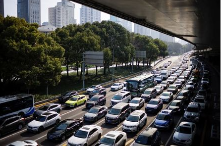 Cars wait in traffic in Shanghai, China March 10, 2021. Picture taken March 10, 2021. REUTERS/Aly Song