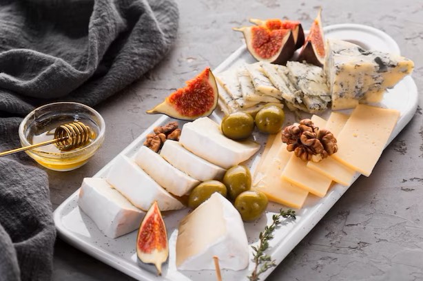 cheese-assortment-platter-with-fig_23-2148326128.jpg