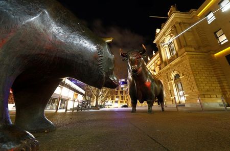 Bull and bear symbols for successful and bad trading are seen in front of the German stock exchange (Deutsche Boerse) in Frankfurt, Germany, February 12, 2019. REUTERS/Kai Pfaffenbach