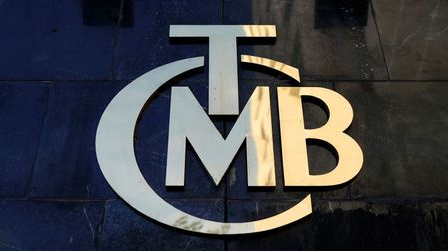 A logo of Turkey's Central Bank (TCMB) is pictured at the entrance of the bank's headquarters in Ankara, Turkey April 19, 2015. REUTERS/Umit Bektas