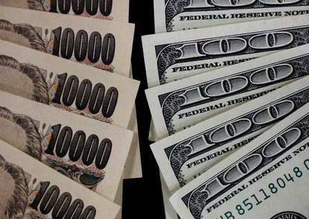 A picture illustration shows U.S. 100 dollar banks and Japanese 10,000 yen notes taken in Tokyo August 2, 2011. The dollar spiked higher against the yen on August 4, 2011 as Japanese authorities intervened to stem the yen's strength. Picture taken August 2, 2011. REUTERS/Yuriko Nakao (JAPAN - Tags: EMPLOYMENT BUSINESS)