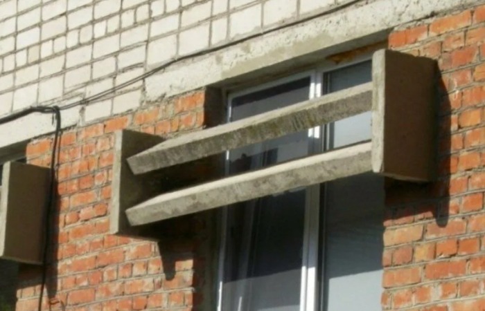 Зачем в СССР на окнах домов были установлены бетонные «козырьки» архитектура,ремонт и строительство