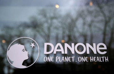 French food group Danone logo is seen at the company headquarters in Rueil-Malmaison near Paris, France, February 18, 2021. REUTERS/Gonzalo Fuentes