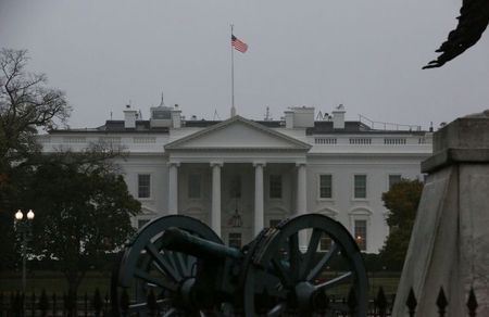 The U.S. flag flies in a dawn breeze on top of the White House before the start of the midterm election in Washington, U.S. November 6, 2018. REUTERS/Chris Helgren