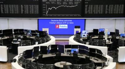 FILE PHOTO: The German share price index DAX graph is pictured at the stock exchange in Frankfurt, Germany, February 15, 2022. REUTERS/Staff