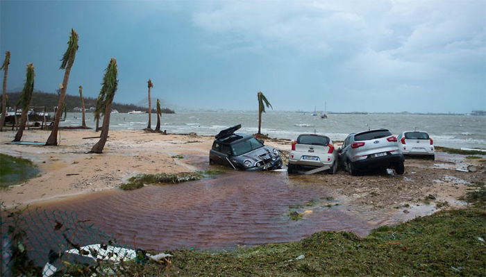 Damaged Cars Are Seen On A St. Martin Beach