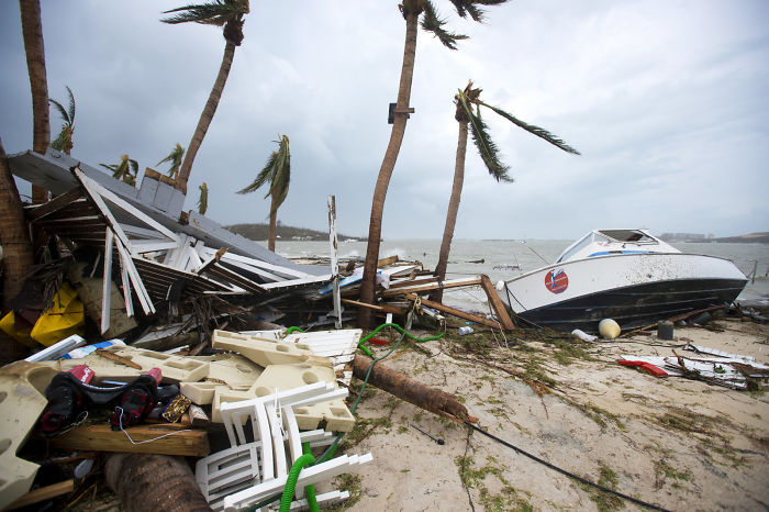 Piles Of Debris And A Boat Are Washed Up Onto Shore In Marigot, Saint Martin, After The Passage Of Hurricane Irma