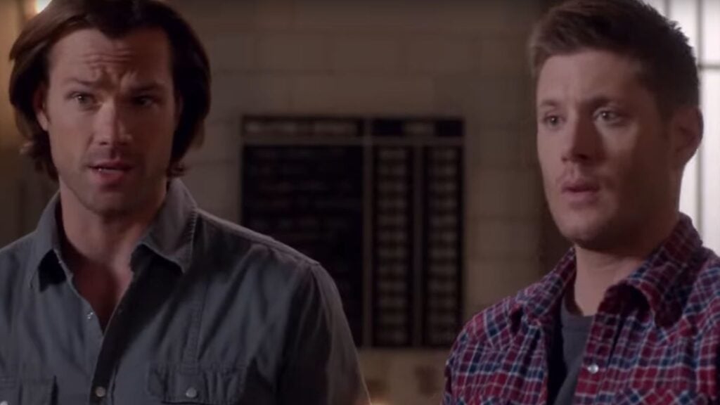 Sam and Dean look confused. - Supernatural Season 11 Episode 22, We Happy Few - CW Promo Screenshot