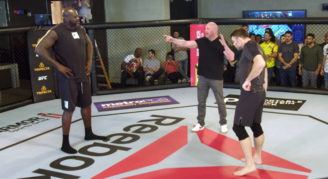 Watch Shaq Take On UFC Legend Forrest Griffin Inside The Octagon, Get Choke...