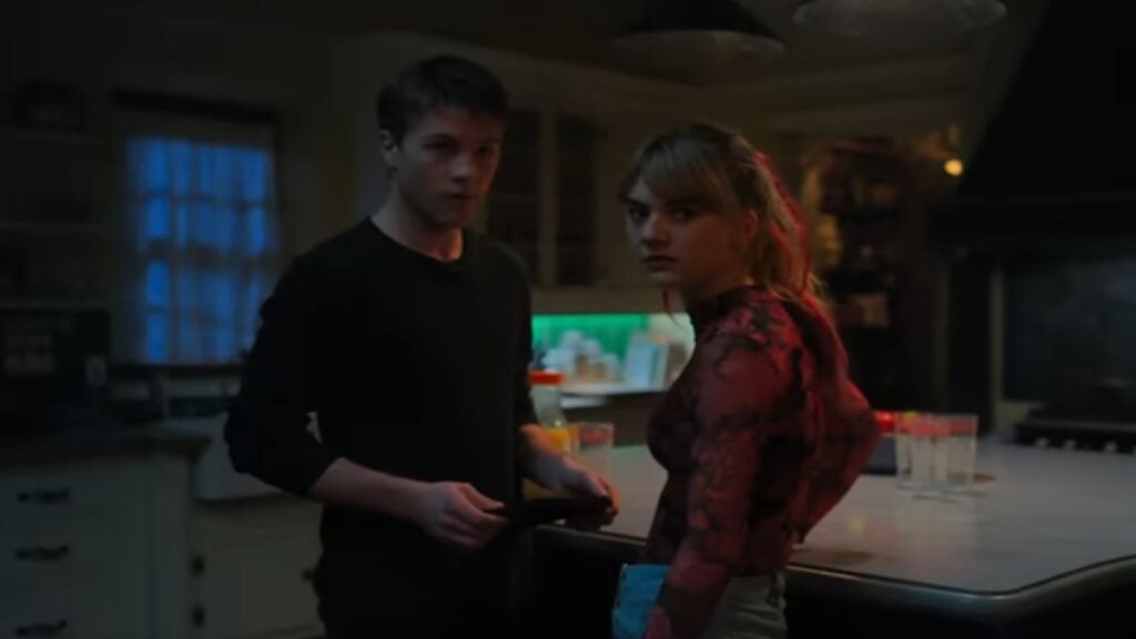 Tyler and Kinsey stand in the kitchen. - Netflix Trailer Screenshot