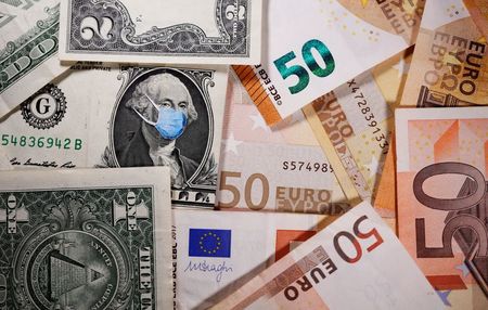 George Washington is seen with printed medical masks on the one Dollar near Euro banknotes in this illustration taken, March 31, 2020. REUTERS/Dado Ruvic/Illustration