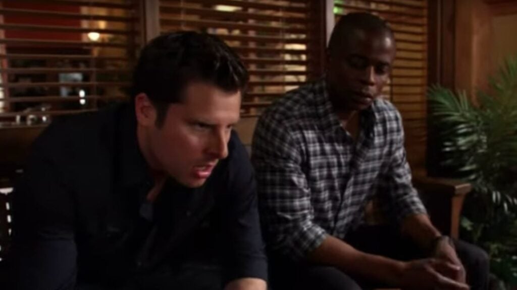 Shawn and Gus sit and talk about a case at the police station. USA Promo Screenshot