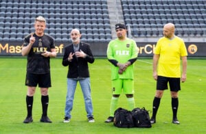 MASTERCHEF: L-R: Host/judge Gordon Ramsay with guest star Larry Freedman and judges Aarón Sánchez and Joe Bastianich in the “LAFC Field” episode.