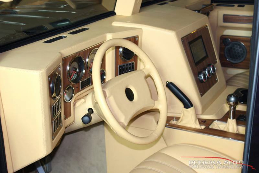 Московское тюнинг-ателье превратило армейский «Тигр» в шикарный внедорожник для VIP-персон Московское тюнинг-ателье превратило армейский «Тигр» в шикарный внедорожник для VIP-персон авто и мото