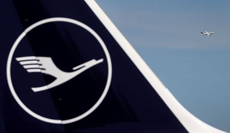 A Lufthansa plane takes off behind a grounded jet at the airport as the spread of coronavirus disease (COVID-19) continues in Frankfurt, Germany, June 2, 2020. REUTERS/Kai Pfaffenbach/File Photo