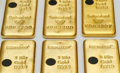 The Sicpa Oasis validator system (bullion protect) is pictured on one kilogram bar of gold at Swiss refiner Metalor in Marin near Neuchatel, Switzerland July 5, 2019. Picture taken July 5, 2019. To match Special Report GOLD-SWISS/FAKES REUTERS/Denis Balibouse