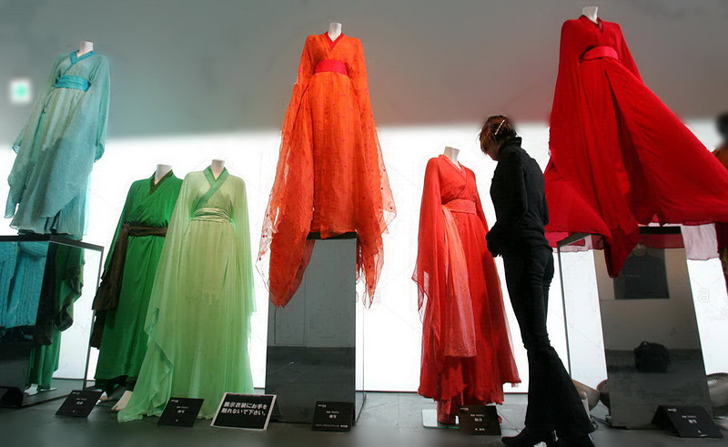 A woman looks at Japanese designer Wada&apos;s costumes in Tokyo