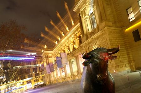 FILE PHOTO: The bull, symbol for successful trading, is seen in front of the German stock exchange in Frankfurt, Germany, February 12, 2019. REUTERS/Kai Pfaffenbach/File Photo