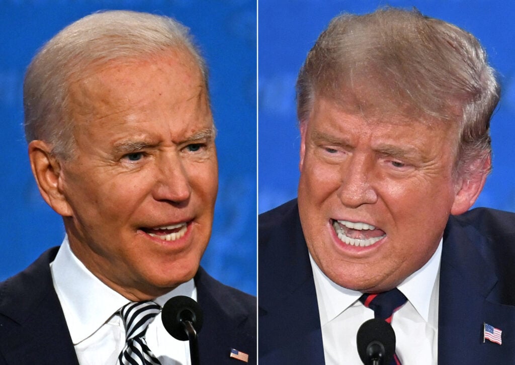 This combination of pictures created on September 29, 2020 shows Democratic Presidential candidate and former US Vice President Joe Biden and US President Donald Trump speaking during the first presidential debate at the Case Western Reserve University and Cleveland Clinic in Cleveland, Ohio on September 29, 2020. 