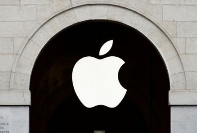 Apple logo is seen on the Apple store at The Marche Saint Germain in Paris, France July 15, 2020. REUTERS/Gonzalo Fuentes